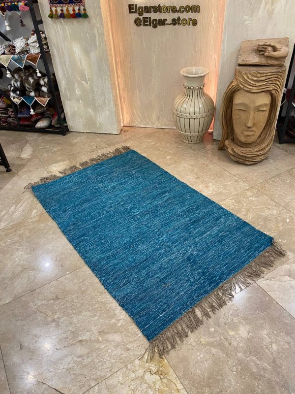 گلیم حرمی آبی روشن طرح ساده مدرن یک و نیم متری